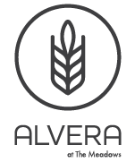 A logo with a wheat stalk in a circle and the word "ALVERA" below it.